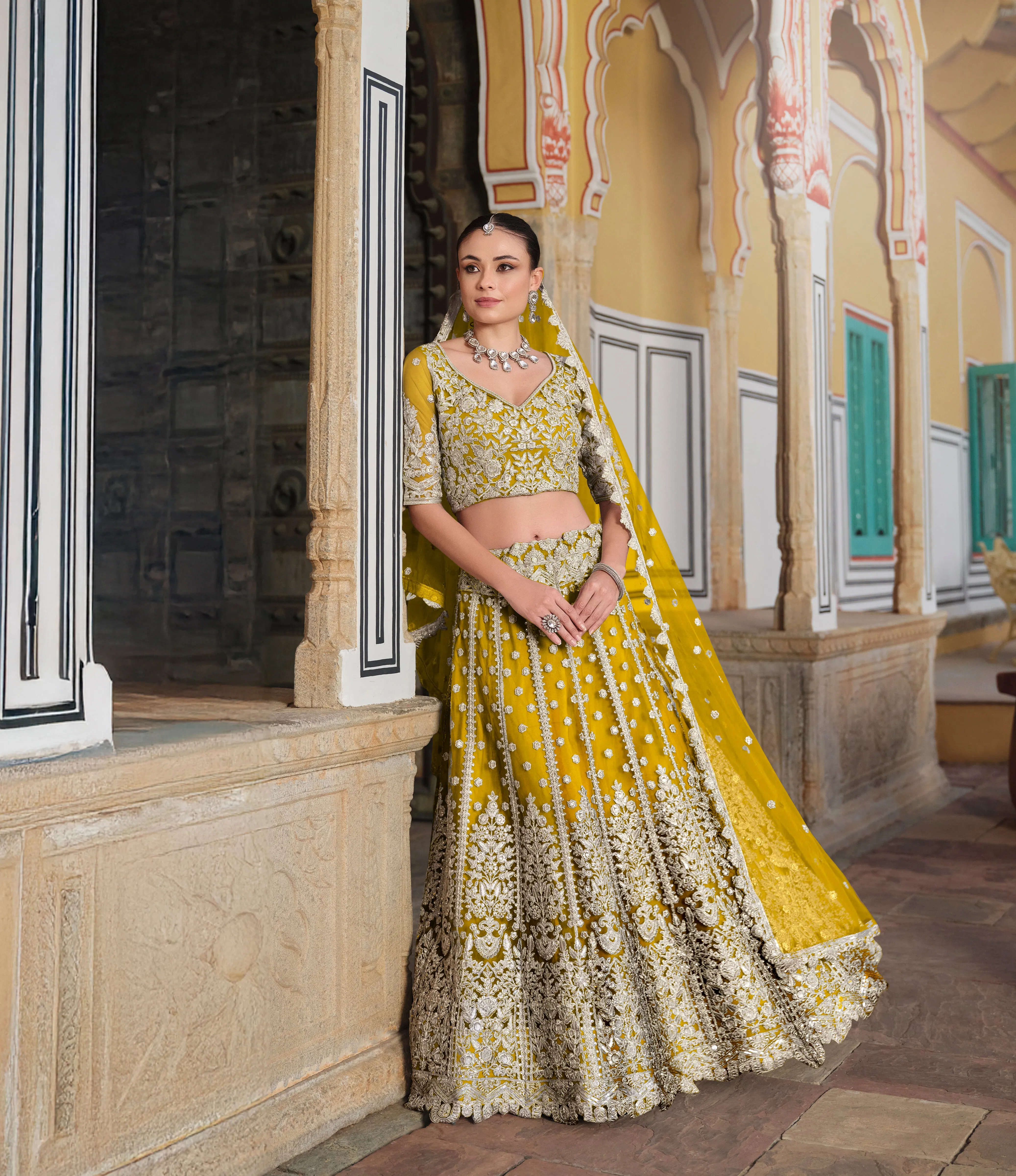 Yellow Embroidered Net Bridal Lehenga Choli